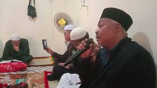 MARKOBAR ' MANGKHATAM QUR'AN DOHOT MANABALKON GORAR ADAT MANDAILING