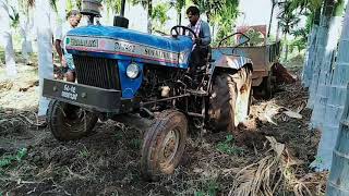 sonalika stuck in mud loaded with trolley