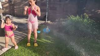 heatwave this weekend ? no problem they are still having fun together with water hose back yard 😂😂