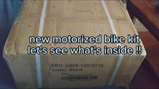 Unboxing my new motorized bike kit.