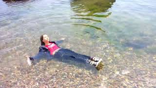 girl in jeans and denim jacket gets wet