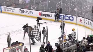 Jordan from TTMG driving atv on LA Kings Ice during intermission