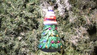 Treetop Santa glass Christmas ornament