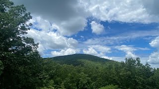 Hiking to top of hanging rock.