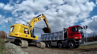 CAT 323 loading TATRA & SCANIA trucks