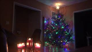 Christmas Tree And Candles At Night