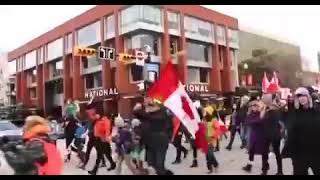 10,000 Canadians marching in Calgary, Alberta in support of the trucker protests.