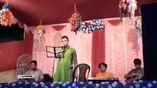 My own new song ....Tumi nirobe kandia jao on stage