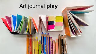 Art journaling and marking making play.