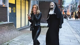 She has no Idea what's  behind Her. Craziest Reactions. The Nun Prank