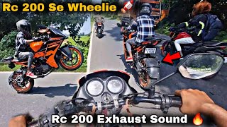 Rc 200 se wheelie 🥰  / RC 200 exhaust Sound 🔥 ktm rc200 V/S tvs raider @TheUK07Rider