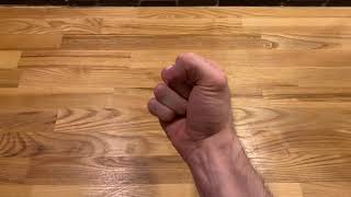 How to clench fist