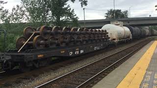 CP freight train passing Maple Meadows Station