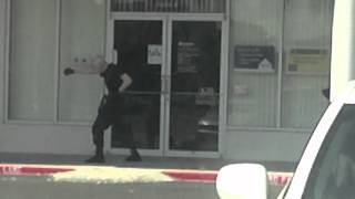 Elderly Man praticing karate outside studio