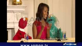 Elmo and Rosita join Michelle Obama.