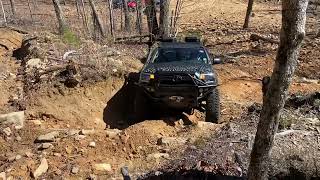 2nd gen Tacoma on 35,s double locked at choccolocco mtn. Back side 1