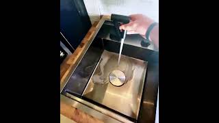 Torva Sink in Action: Space-Saving Design with Foldable Faucet!