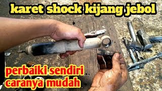 cara memperbaiki karet shock kijang