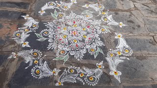 lotus rangoli with 5*3dots cute side border design