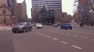 Free 4K Royalty-Free Stock Video: Cars driving through intersection in city