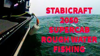 Stabicraft 2050 Supercab out in rough waters fishing. | Stabicraft on the Sound