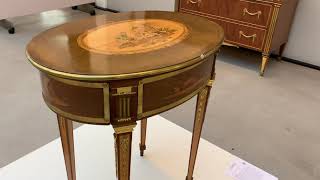 An oval working table by David Roentgen