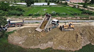 New Project, Processing Pour Soil Bury The Lake with Bulldozer Push Stone into Water And Dumb Trucks