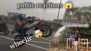 Public reactions 😱 on wheelie || ktm or r15m wheelie || meet up || motovlogger Anand