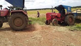 #Mahindra 275 pulling with Mahindra 575 with trolley paddy load