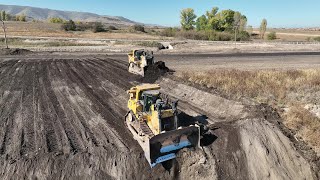 Two Caterpillar D9T Bulldozers Levelling A Huge Mining Area - 4k