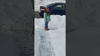 Kids shoveling. Noah and avrien. Cambri watching