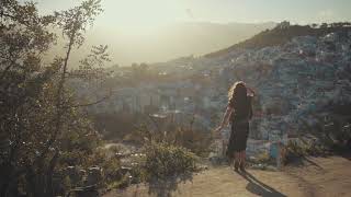 Free Stock Footage girl walking at dawn hill town  Full HD No Copyright