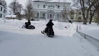 Mackinac Island leaving downtown on Snowmobiles March 2019