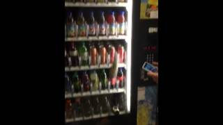 Breaking bottles in a vending machine