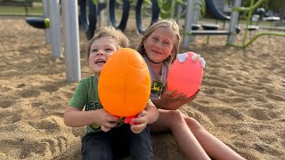 Hiding fun surprise egg toys at the playground for kids | it's a fun Fall playground vlog!!