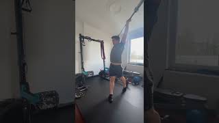 Squat + rotation + push press barre