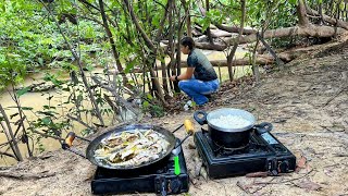 Montamos acampamento na beira do rio pescamos e fizemos peixe frito