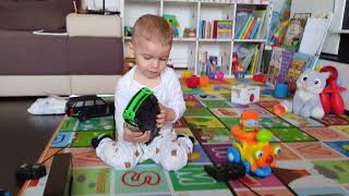 Baby playing with toy car