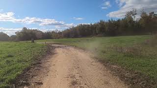 Cat & mouse with a yz250. Camera is on a renegade 1000r xxc on trail 1