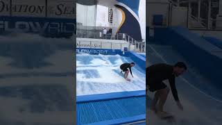 Surf Simulator Onboard Cruise ship! Royal Caribbean Flowrider 🌊🏄🏻‍♂️ #cruise #shorts #travel