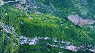 China Cliff Village | DRONE ASCENT UP STEEL LADDER