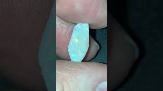 Solid Light Lightning Ridge Opal from Australia with good play of colours.