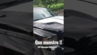 Dodge Ram 1500 Laramie Black Edition with hood white stripes