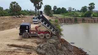 Great Project Bulldozer KOMATSU D60P Filling Up Deep Pond, Hino Truck Unloading Stone Dirt Mud