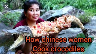 How do chinese women cook crocodiles.how do chinese cook crocodile.women cook crocodile for her dogs